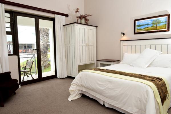 Double bedroom with private patio.