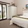 Double bedroom with private patio.