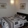 One of the Bedrooms with a Queen Size Bed