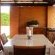 DOWNSTAIRS VERANDAH: LARGE TABLE & CHAIRS