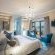 Luxury room with patio and lagoon view