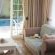 Family Room with pool view - Golden Dawn