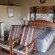 Open plan bedroom in a 2-Bed Chalet