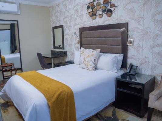 Glancing Left (Pty) Ltd t/a Q's Boutique Stay - 250299