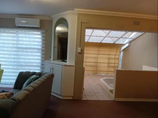 The Rooftop Haven - Communal lounge/ TV room