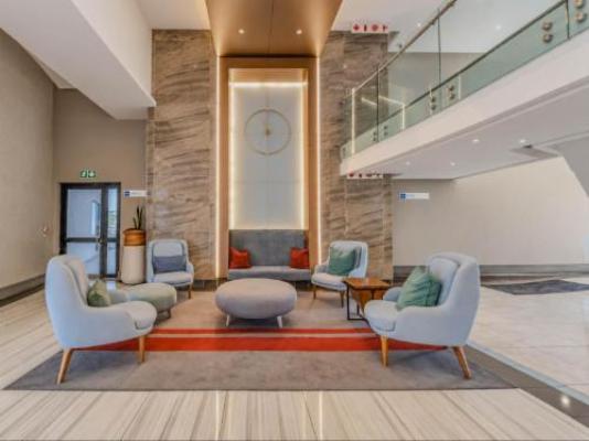 Menlyn 1-Bed Apartment Parking & Pool - Living Room