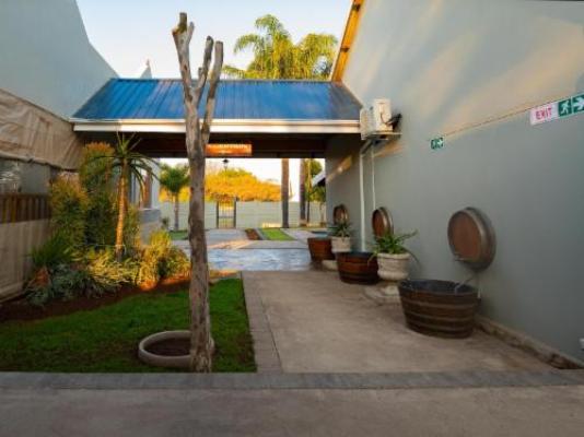 Presidents Boutique Lodge - Garden view