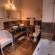 En-suite Bathroom with bath at Karoo View Cottages