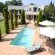 The swimming pool and garden area