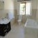 New Deluxe Room bathrooms