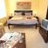 Junior-Suite Pinotage - Lounge and Bedroom