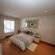 WHITE SELF CATERING APARTMENT BEDROOM