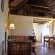 lounge area with fireplace in Lazy Leopard House