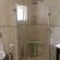 En suite bathroom with shower and bath
