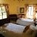 Re a Lora Bedroom with Twin Beds and en-Suite Bathroom