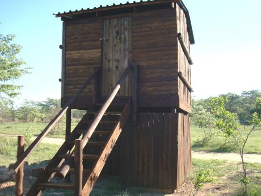 Waterhole hide with chairs and 2 beds. Overnight and experience the night life of the African bush...