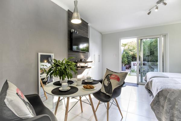 Cat's Eye Jewel Dining Area with view to the garden