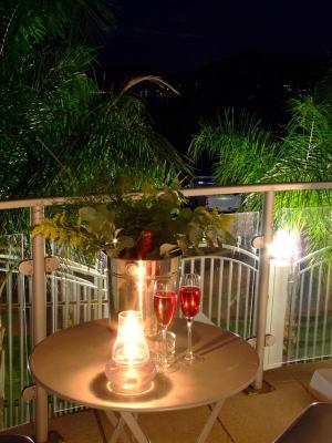 Champagne with Candlelight on the Communal front balcony or Gazebo