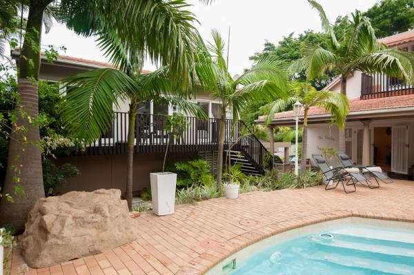 view of rooms from the pool area