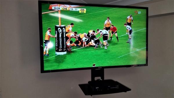 Wall-Mounted LED Television + Decoder