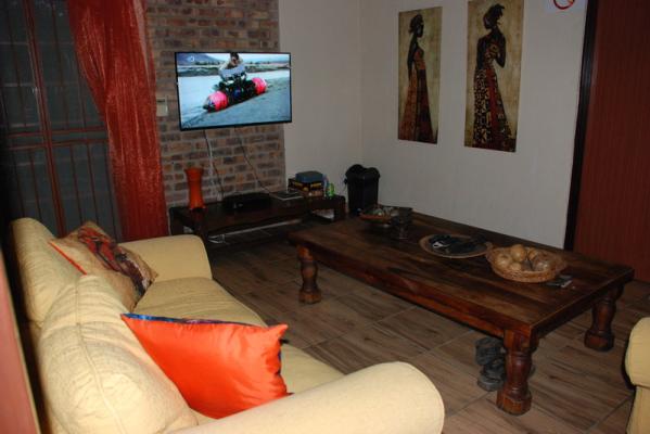 The TV lounge upstairs with DSTV available.