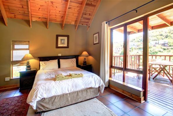 Main bedroom with wooden deck