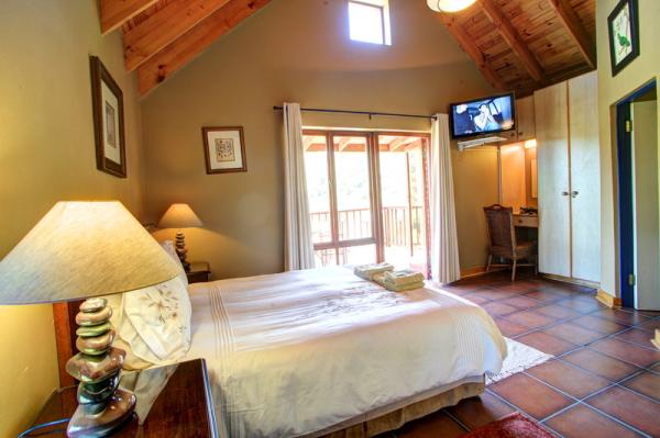 Main bedroom with wooden deck