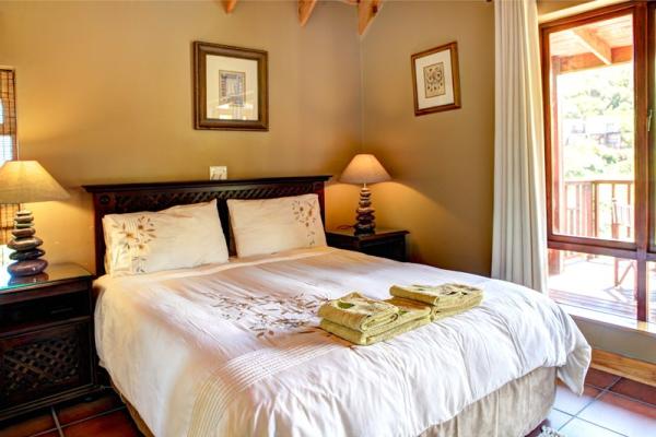 Main bedroom with wooden deck