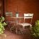 DOWNSTAIRS VERANDAH: GARDEN TABLE & CHAIRS