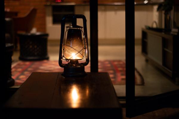 DOWNSTAIRS VERANDAH: LANTERN AT NIGHT