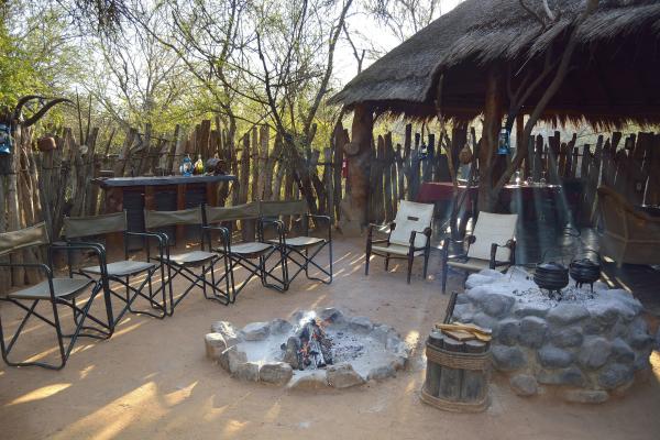 Chat about the day's sightings in our rustic boma.