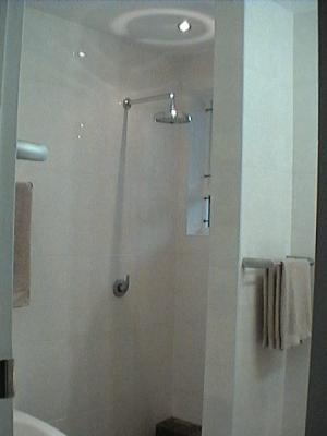 Bathroom with shower and bath