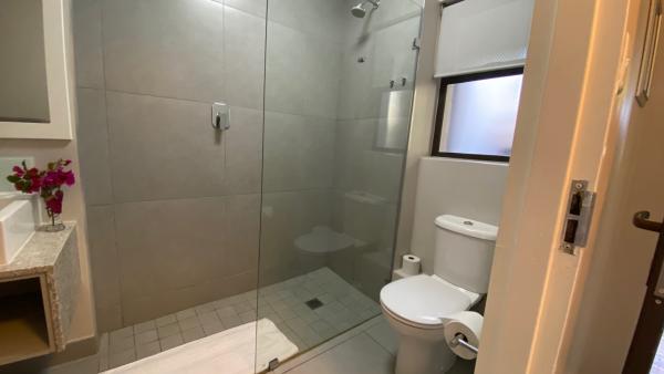 Unit 66A bathroom with bath and shower