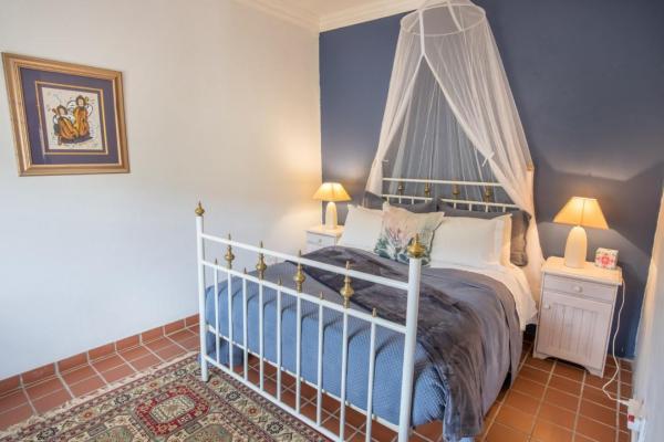 Newly renovated bedroom with views over the olive orchard and mountains. En-suite full bathroom