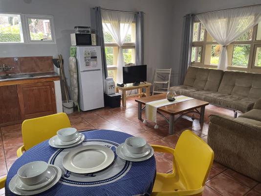 Apartment E- Open plan lounge and Fully equipped Kitchen