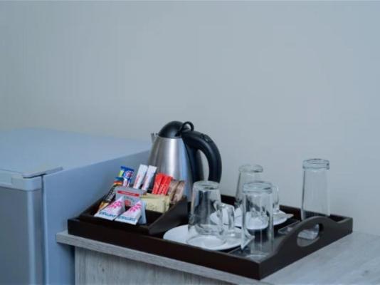 Glancing Left (Pty) Ltd t/a Q's Boutique Stay - 250292