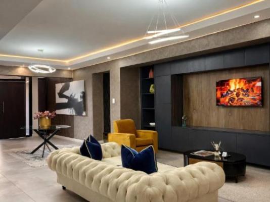 13 on Tenth - Communal lounge/ TV room