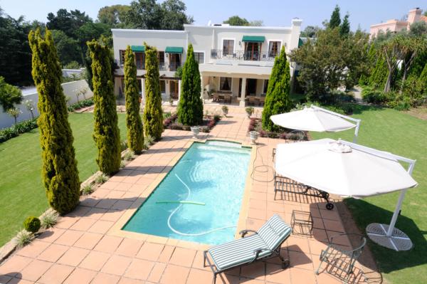 The swimming pool and garden area