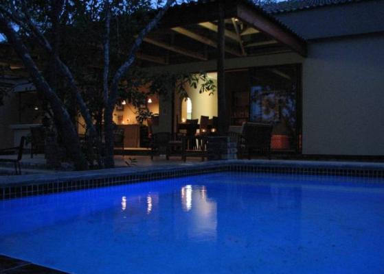 night time view of the pool