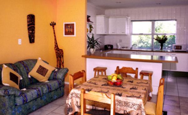 Fully equipped guest kitchen and sitting room 