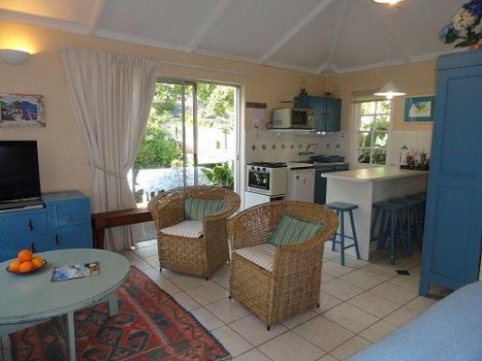 The Garden Cottage living area and kitchenette