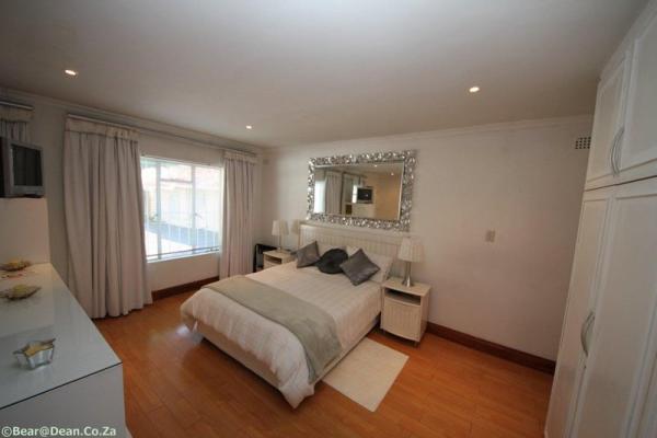 WHITE SELF CATERING APARTMENT BEDROOM