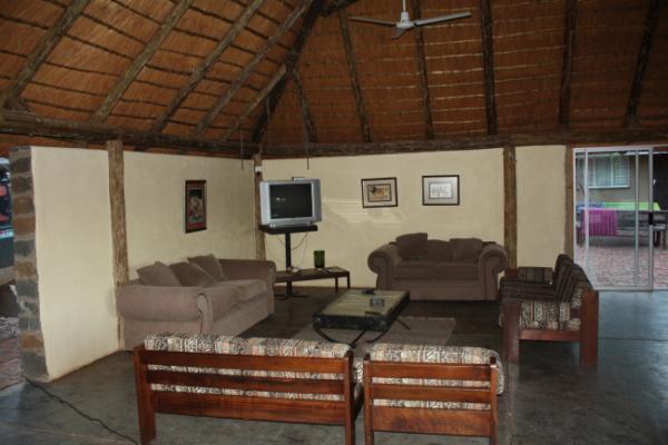 Lounge area under big thatched roof
