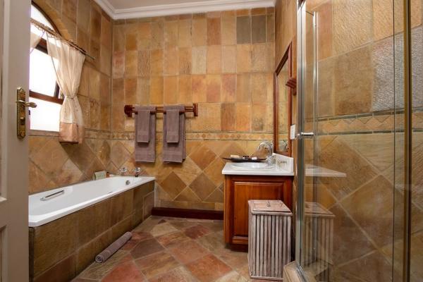 Deluxe King Room with Bath and Shower 