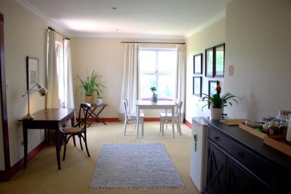 Spacious dining, work and kitchenette area