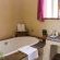 En-suite bathroom with Deep-soaking bath & shower 